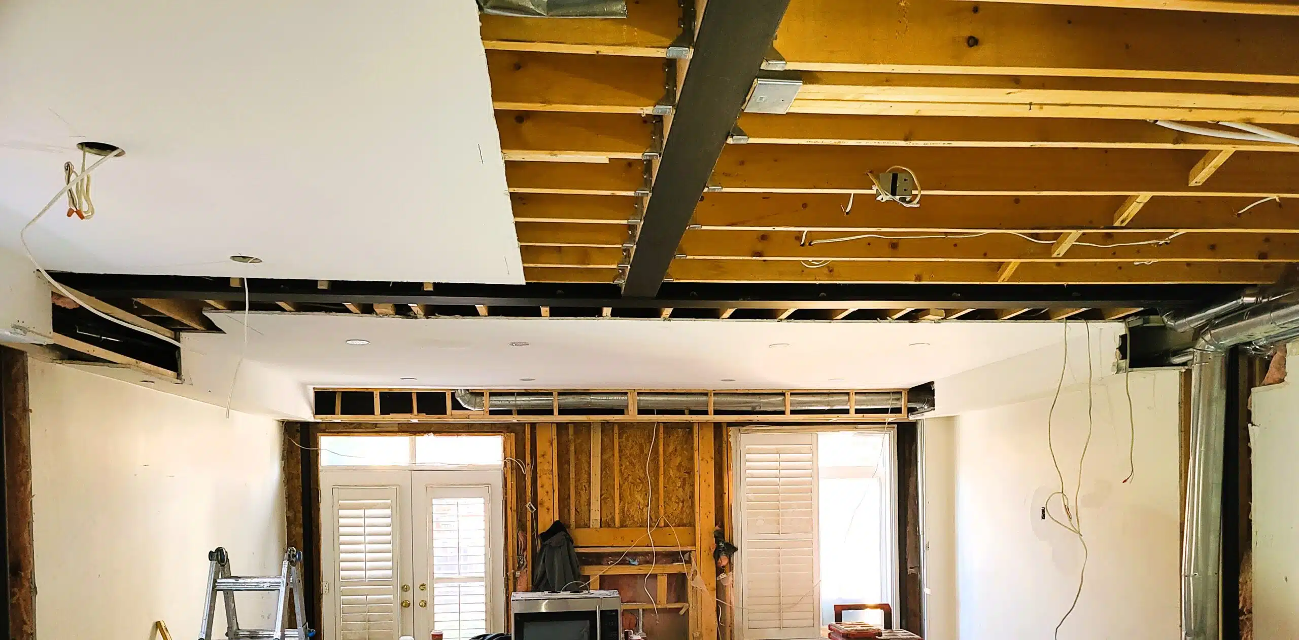 How to Remove a Load Bearing Wall and Install a Support Beam for an Open Concept Home